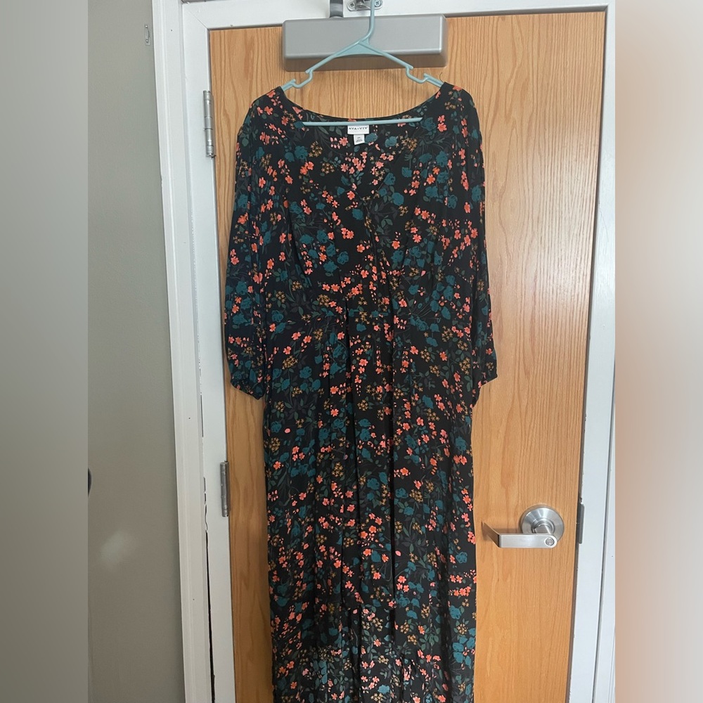 Long sleeve, high-low, floral dress.